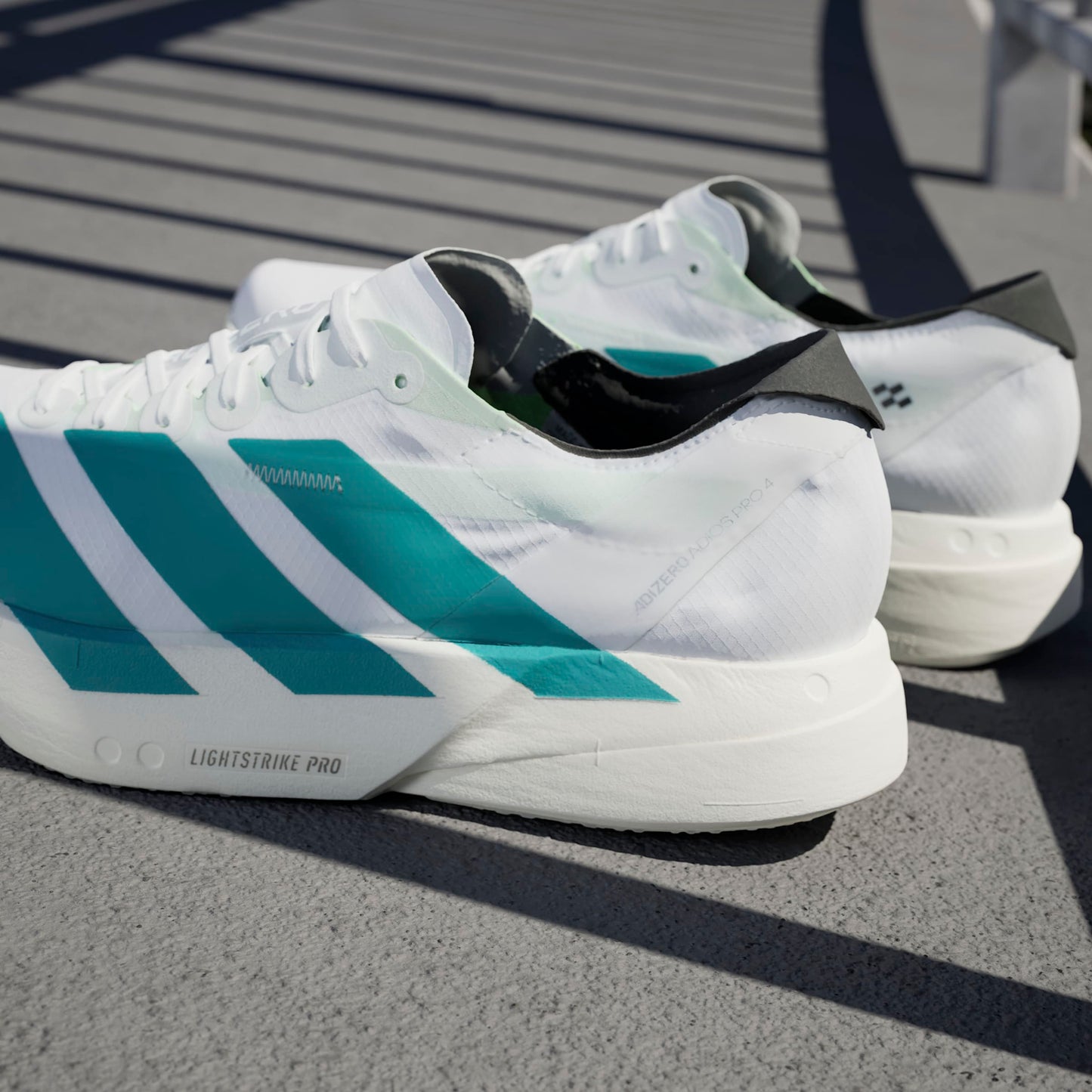 adidas Adizero Adios Pro 4 | Footwear White / Pure Teal / Carbon | Mens