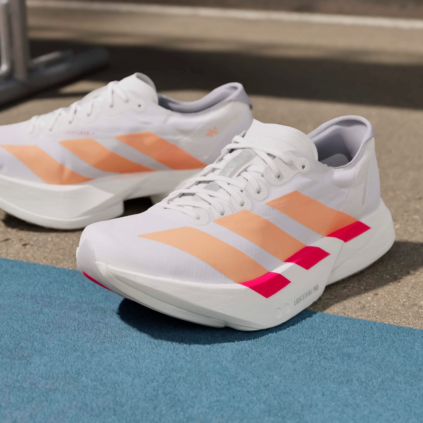 adidas Adizero Adios Pro 4 | Cloud White / Beam Orange / Lucid Red | Womens