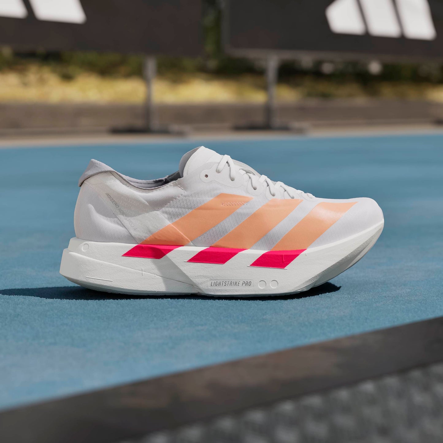 adidas Adizero Adios Pro 4 | Cloud White / Beam Orange / Lucid Red | Womens