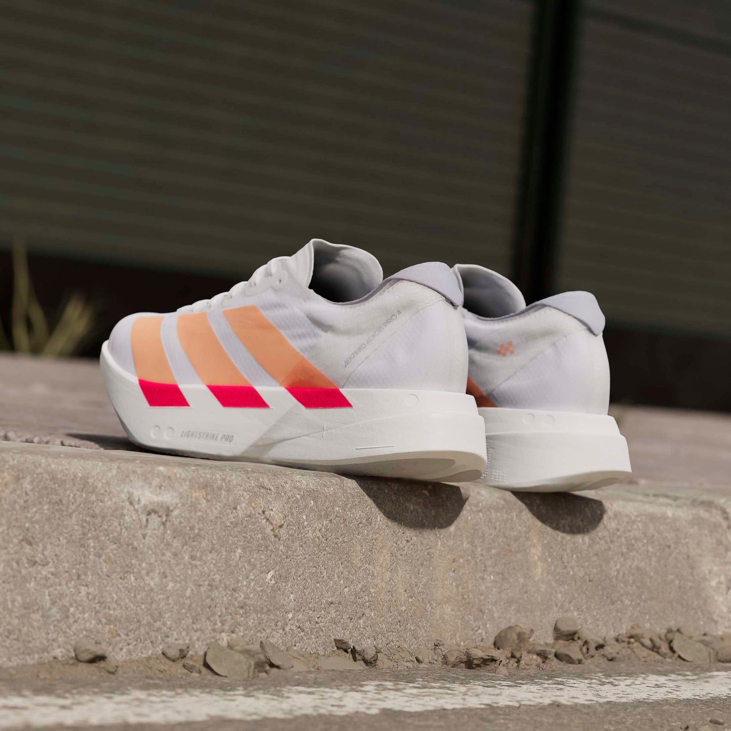 adidas Adizero Adios Pro 4 | Cloud White / Beam Orange / Lucid Red | Womens