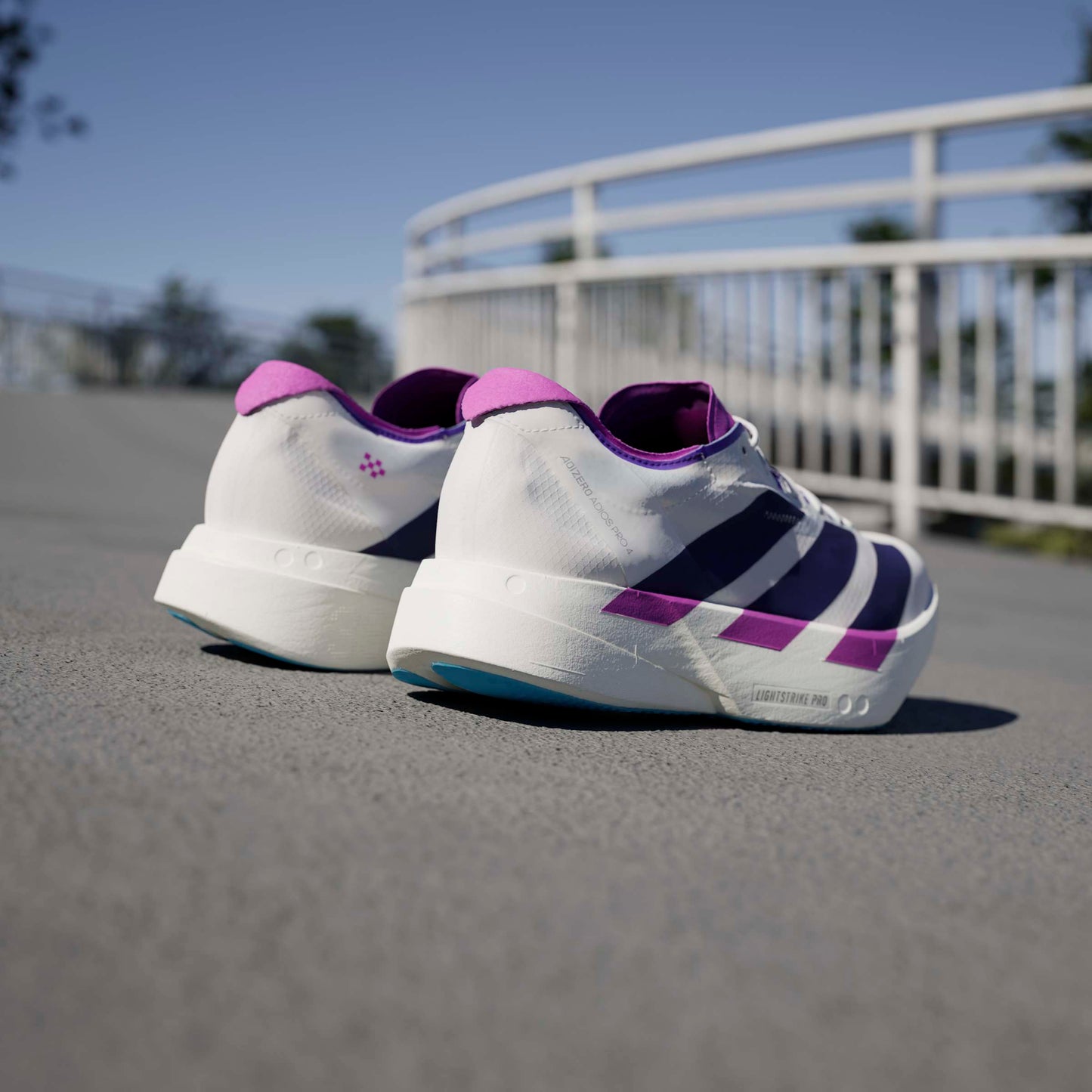 adidas Adizero Adios Pro 4 | Core White / Collegiate Purple / Semi Blue Burst | Womens
