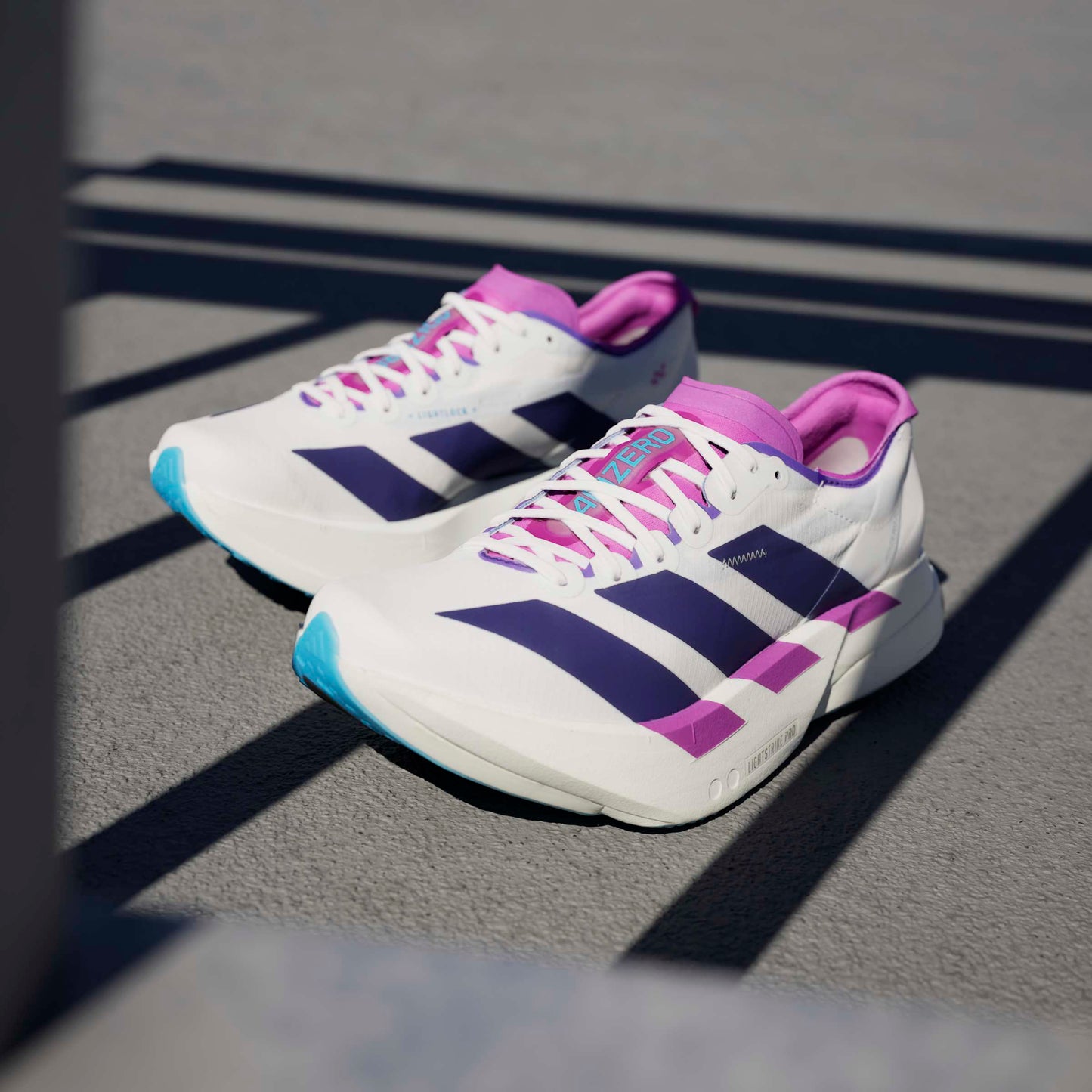 adidas Adizero Adios Pro 4 | Core White / Collegiate Purple / Semi Blue Burst | Womens