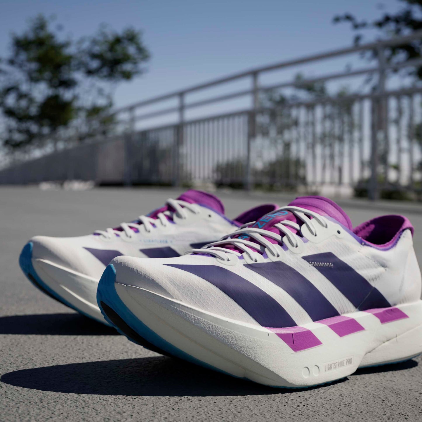 adidas Adizero Adios Pro 4 | Core White / Collegiate Purple / Semi Blue Burst | Womens