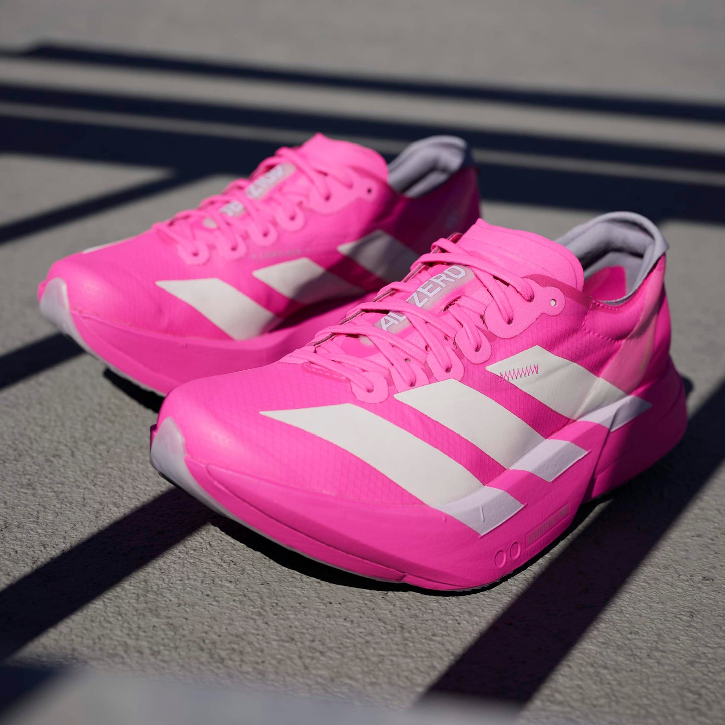 adidas Adizero Adios Pro 4 | Shock Pink / Zero Metallic / Aurora Plum | Womens