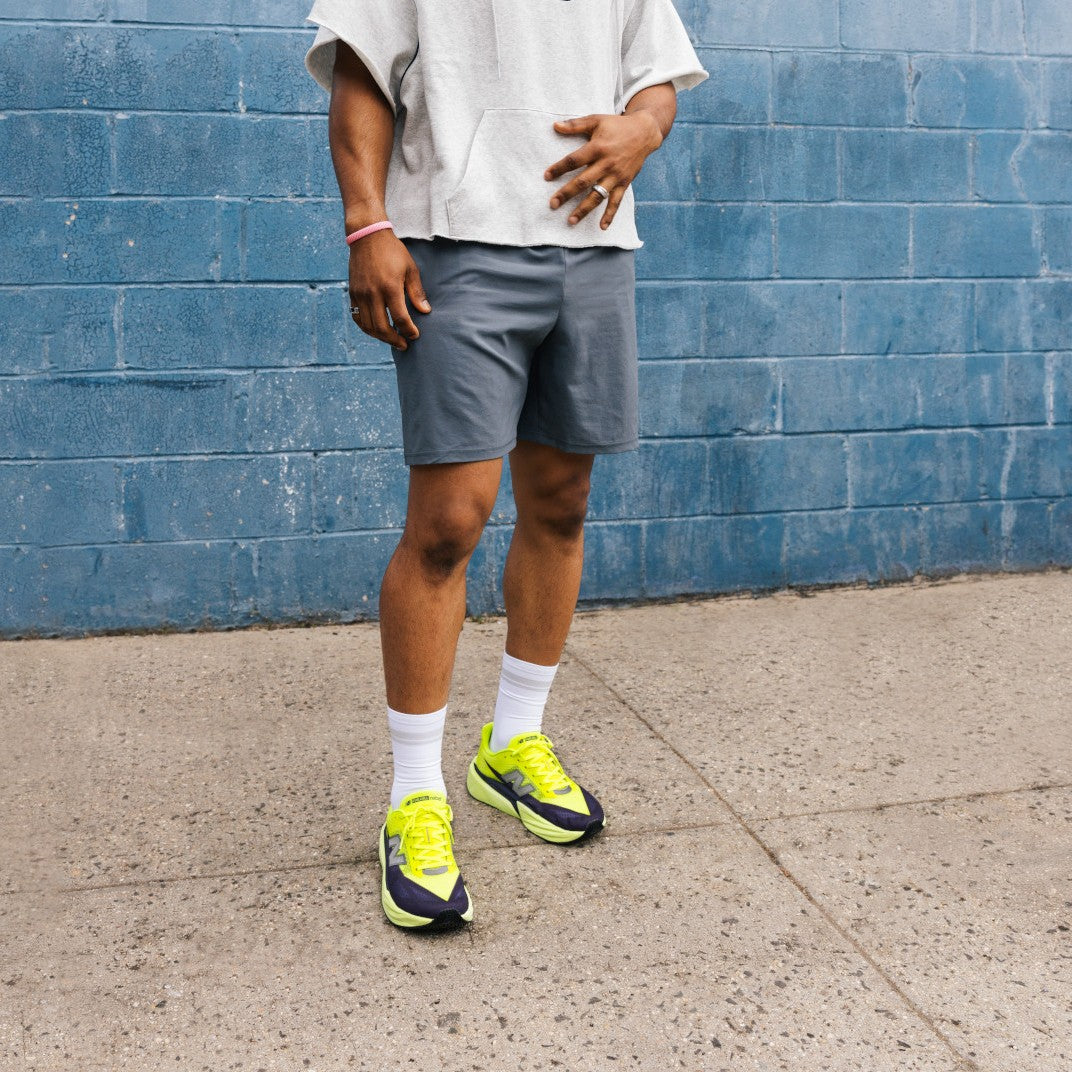 New Balance FuelCell Rebel v5 | Alkaline Green / Boysenberry / Dark Silver Metallic | Mens